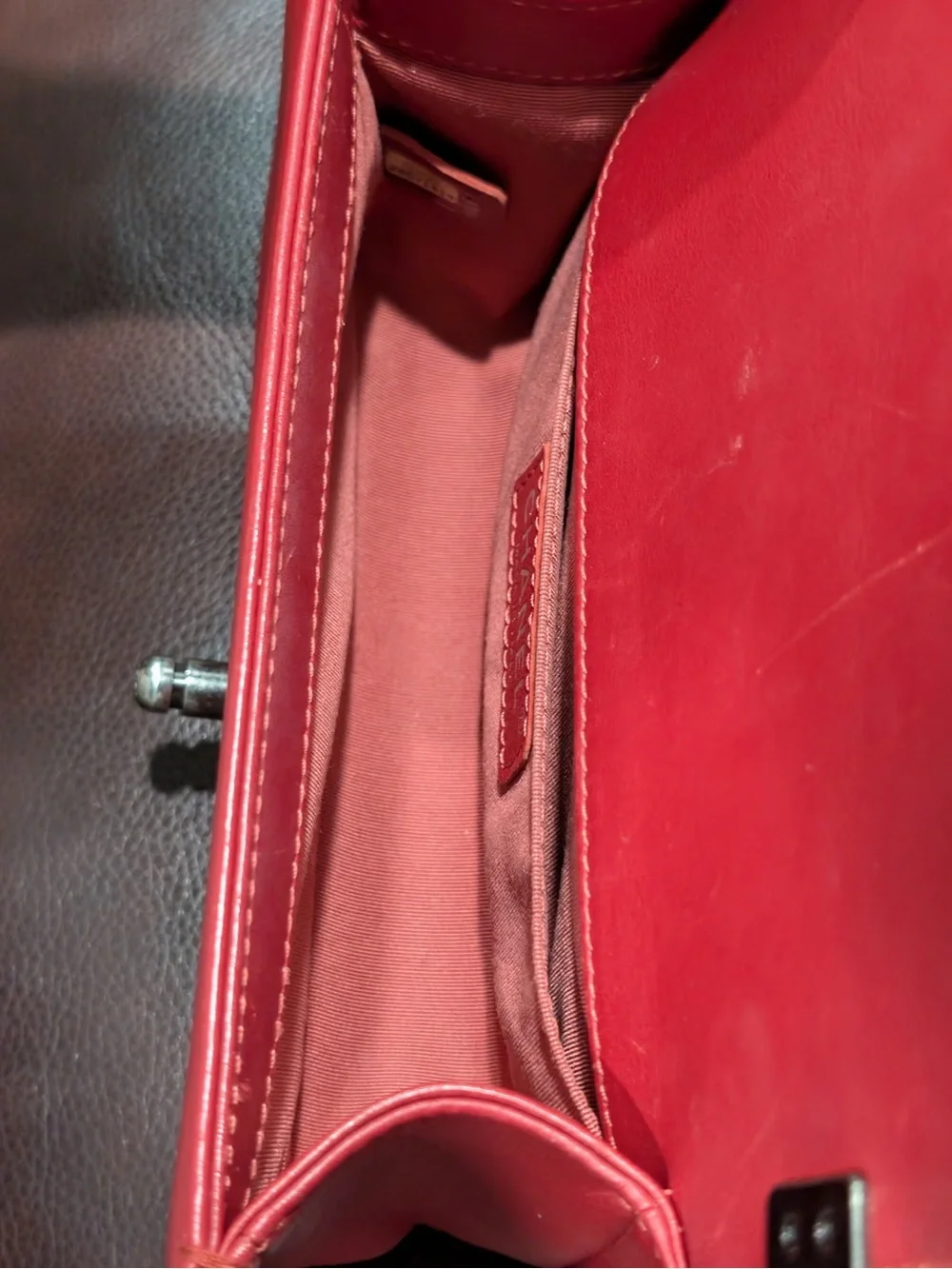 CHANEL Red leather small Boy with gunmetal tone chain
